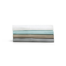 Load image into Gallery viewer, a stack of folded Malouf Bamboo Rayon Sheet Set