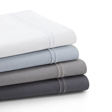 Load image into Gallery viewer, Stack of Supima Cotton Sheet Seton a white background
